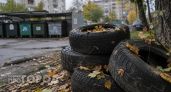 В Дзержинске водителю грузовика грозит крупный штраф за свалку покрышек во дворе дома