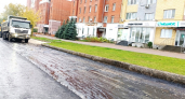 В Дзержинске укладывают асфальт под дождем в Свято-Тихоновском проезде
